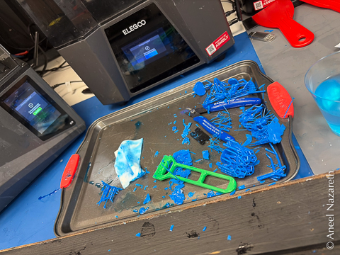 A whole tray of shards of blue print failures